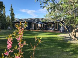 Exterior of Whitehorse bungalow on a sunny day.