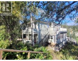 <div class="price">$599,900</div> 717 8th Avenue<br>Dawson City, Yukon<br><div class='bed_bath'>2 Bed | 2 Bath</div>